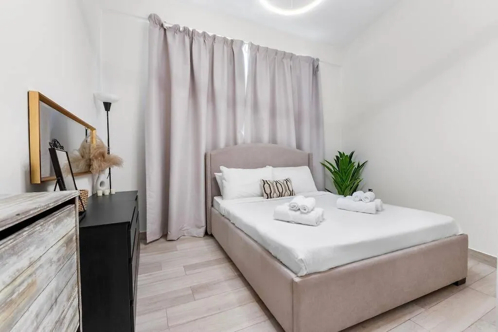 Апартаменты Waves - Stylish 1Br In Jvc With Balcony & Pool Дубай