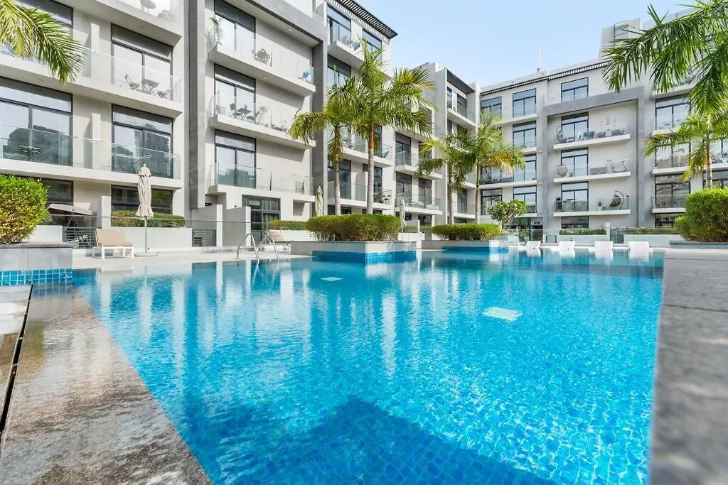 Апартаменты Waves - Stylish 1Br In Jvc With Balcony & Pool Дубай ОАЭ
